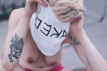 Henna Nueller taking off T-shirt